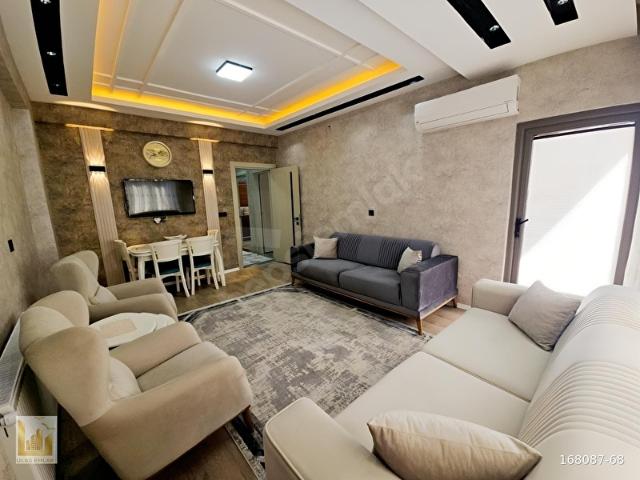 ULAŞ EMLAKTAN NARLIKUYUDA SATILIK LÜKS 2+1 BAKIMLI DAİRE