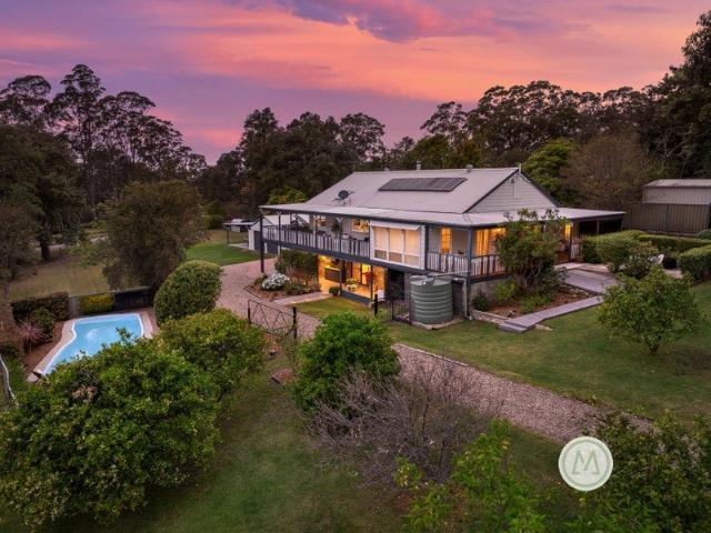 ULTIMATE TRANQUIL SETTING APPROACHING AN ACRE IN SIZE!