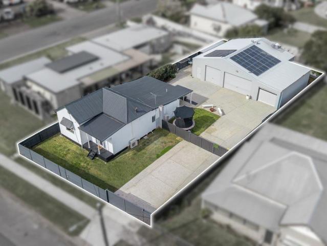 Ultimate Dream Home for Car Enthusiasts, Toy Lovers or Tradies with a 182sqm Shed