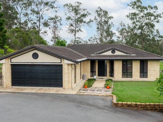 Ultimate Family Haven: 4 Bed Acreage with Massive Shed & Outdoor Patio!
