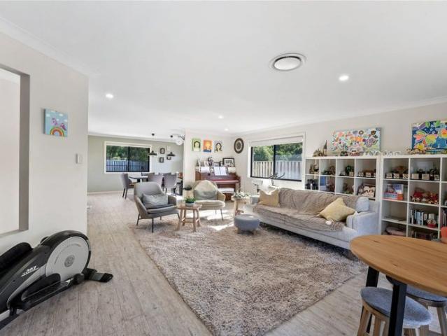 Ultimate Family Paradise with Sparkling Pool in Pacific Pines!