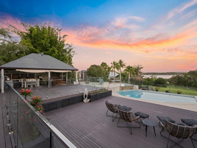 Ultimate Lifestyle Acreage with Pool, Sheds and Direct Lake Reserve Setting