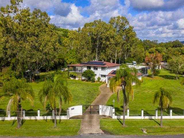 Ultimate Riverfront Acreage: Luxury 2 Acre Estate with Pool House & Commercial Fishing