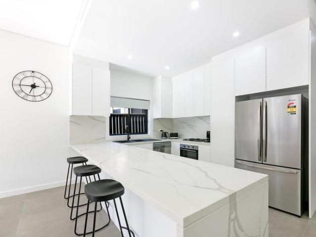 Ultra Modern Air Conditioned Five Bedroom Duplex with Single Garage!