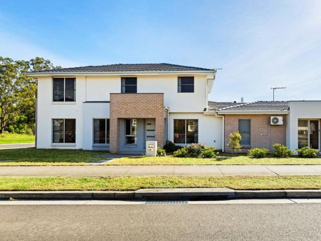 Ultra Modern Family Sanctuary 5 Bed 3 Bath Double Garage ! With Multiple Living Areas, Gourmet Walk In Pantry & Private Yard in Gables!