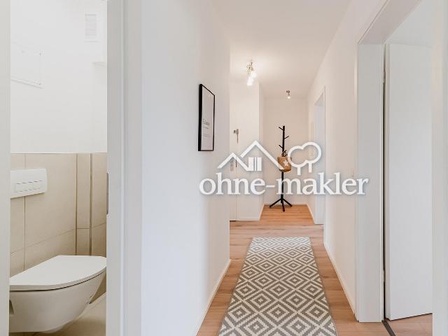 Umfangreich modernisierte 4 Zimmer Wohnung mit Südloggia & Einzelgarage