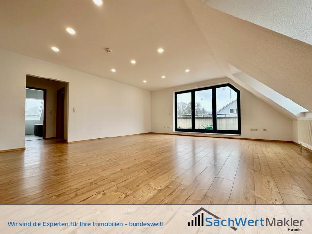 Umfangreich sanierte Maisonette Wohnung mit Dachterrasse und Tiefgarage