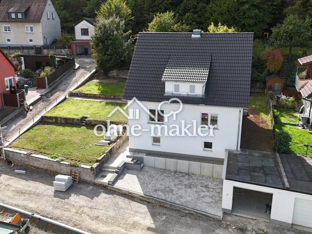 Umfassend modernisiertes Einfamilienhaus mit großem Grundstück und Waldanteil