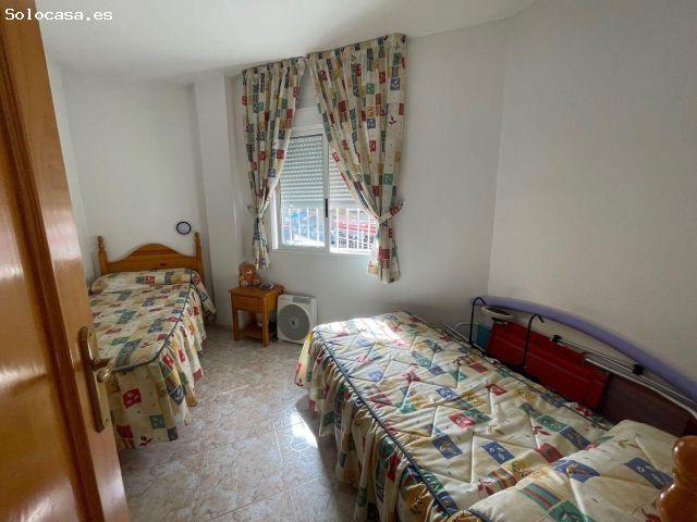 Un apartamento con piscina y garaje grande