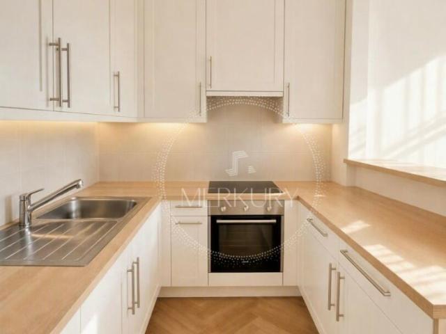 Un charmant appartement de 3P situé dans le quartier de St Jean