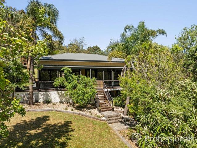UNMATCHED FLEXIBILITY & OPPORTUNITY ON ¾ ACRE TWO HOMES + STUDIO