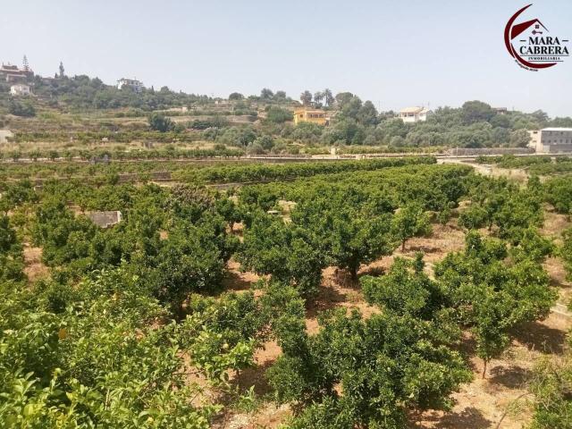 Una casa legal con gran terreno y vistas de ensueño en Font d’en Carròs