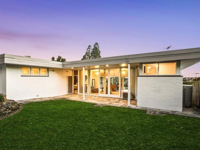 Under capitalised mid century architectural charmer with water views