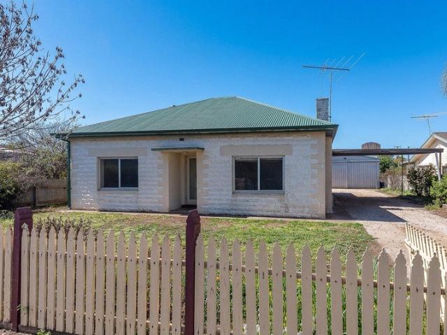 UNDER OFFER Character Stone Home Ready for Your Vision on 809m² Block