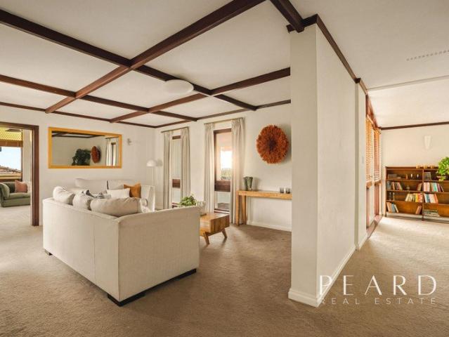 Understated modernist elegance with sweeping views