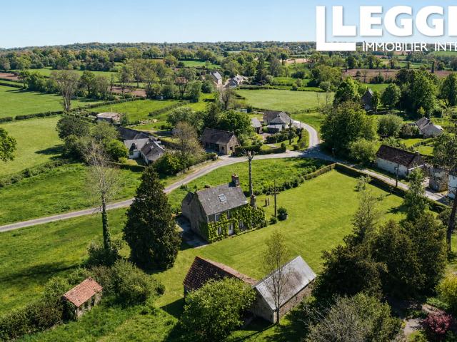 Une charmante maison de 4 chambres, 130 m2 dans un cadre bucolique avec un grand jardin et un garage