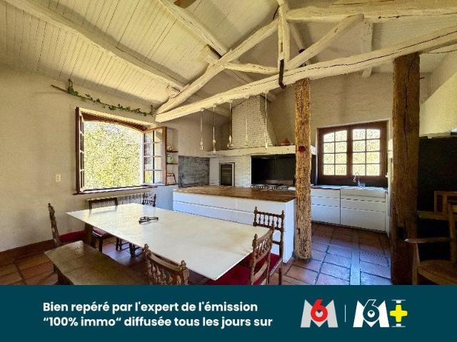 Une maison à usage d'habitation avec dépendances, étang et t. 260m² Terre De Bancalié