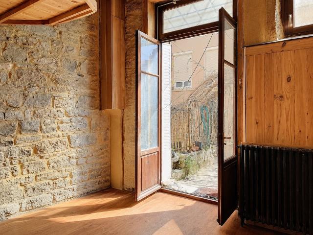 UNE MAISON EN HAUT DES PENTES