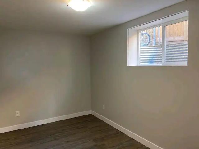 Unfurnished 1BR + office/den near Marda Loop immediate move in