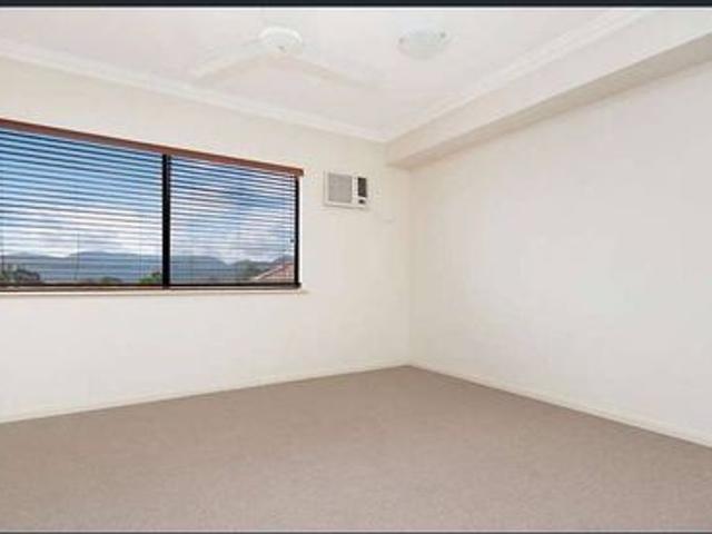 Unfurnished top Floor Unit in Excellent Condition