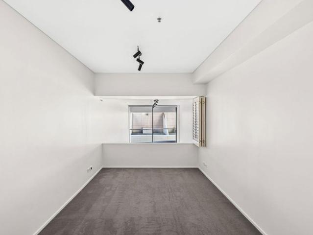 Unfurnished two bedroom apartment, open plan w/ balcony