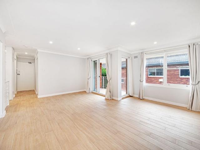 Unfurnished Two Bedroom Apartment With Tandem Off Street Parking
