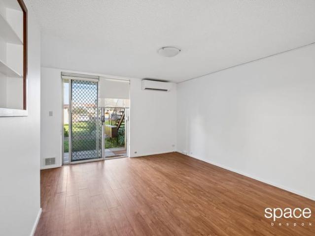 Unfurnished unit freshly painted throughout