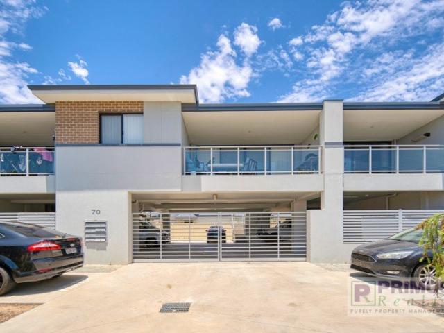 UNFURNISHED modern first floor apartment with secure parking