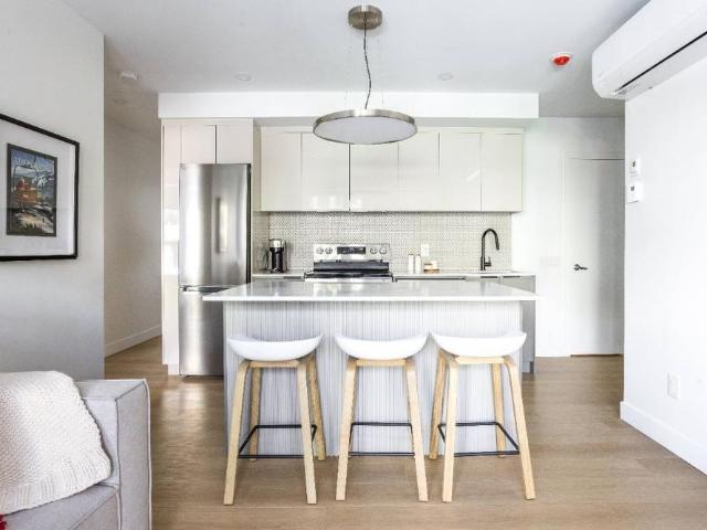 Unité Mackenzie — Modèle rez de jardin | 2 chambres | Terrasse privée