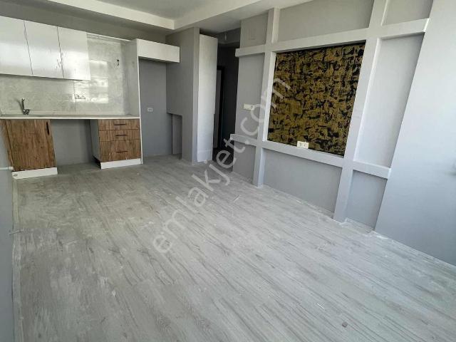 Üniversite~yanı~1+1~sıfır~caddeye~1~parsel~yatırımlık~cazip~