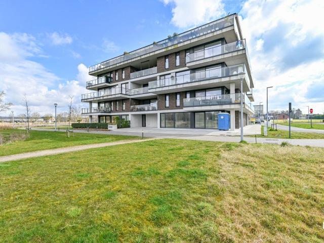 Uniek bijna energieneutraal hoekappartement met ruim terras