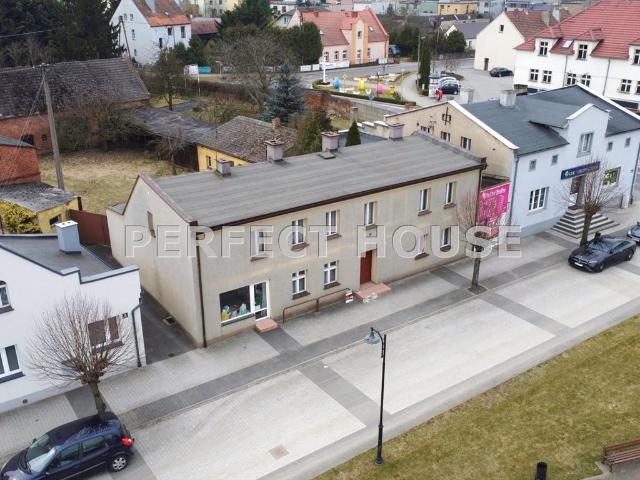 Dom z lokalem usługowym w centrum Nekli 1758 m²
