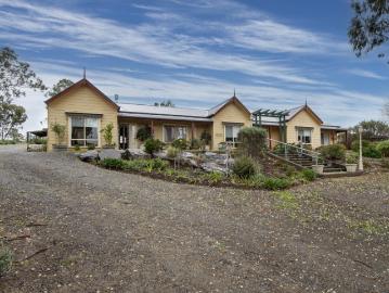 UNIQUE COUNTRY LIVING AT ITS BEST TWO HOMES UNDER ONE ROOF
