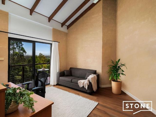 Unique mud brick sanctuary with panoramic valley & ocean views