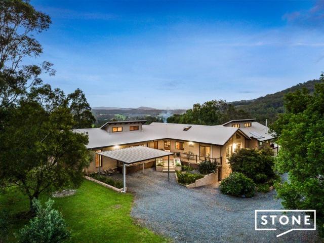 Unique mud brick sanctuary with panoramic valley & ocean views