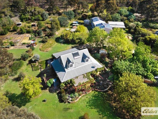 UNIQUE PICTURESQUE HAVEN ON 12 ACRES CLOSE TO TOWN