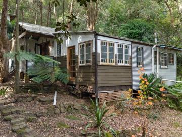 Unique River Hideout Offering Tranquil, Creative Living