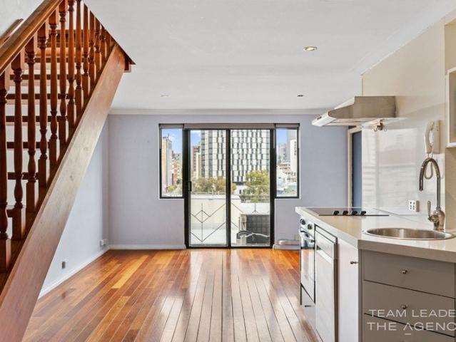 Unique Three Level Apartment with City Views
