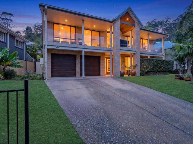 Unique Tri Level Family Home with Elevated Views & Multiple Living Spaces!