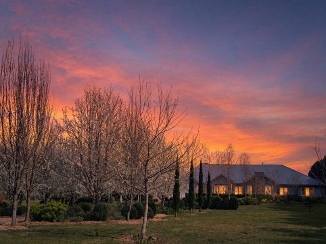 Unparalleled Luxury on 5 Pristine Acres in the Heart of Exeter