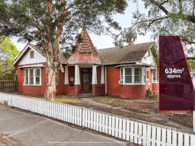 Unparalleled potential on a prominent Windy Hill corner