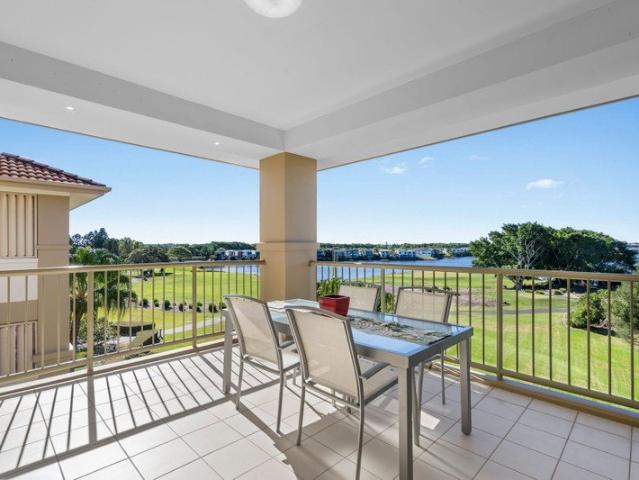 Unrivalled Top Floor Golf Front Living in the Heart of Hope Island Resort