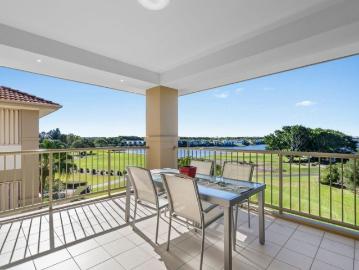 Unrivalled Top Floor Golf Front Living in the Heart of Hope Island Resort