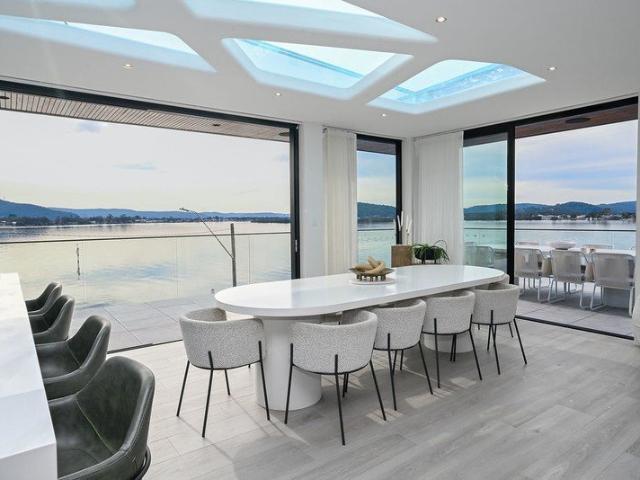 UNRIVALLED WATERFRONT LUXURY ARCHITECTURAL MASTERPIECE WITH ROOFTOP GLASS INFINITY POOL