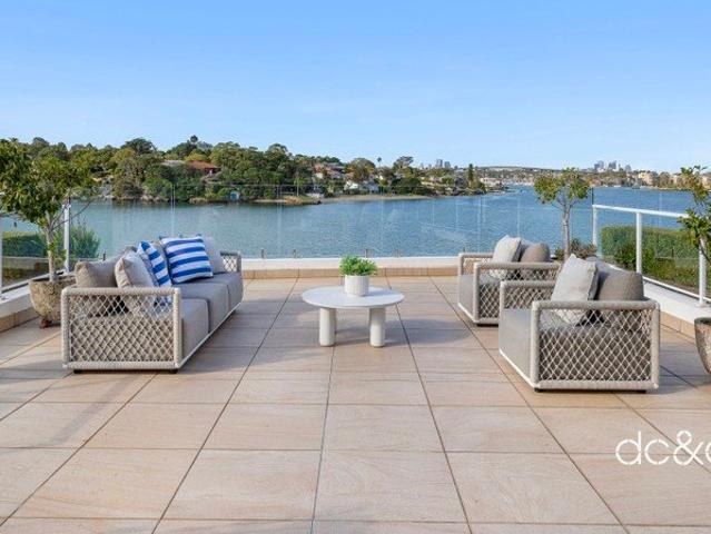 Unrivalled water's edge living in an exclusive riverside address