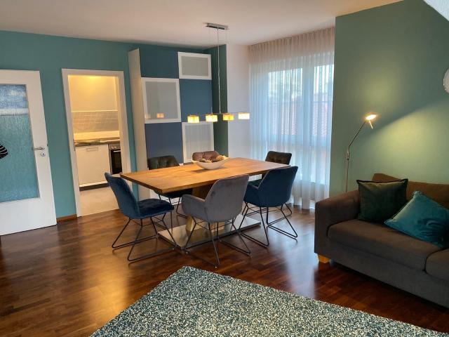 UNTERHACHING Sunny 2 room top floor apartment with south facing balcony, utilities included