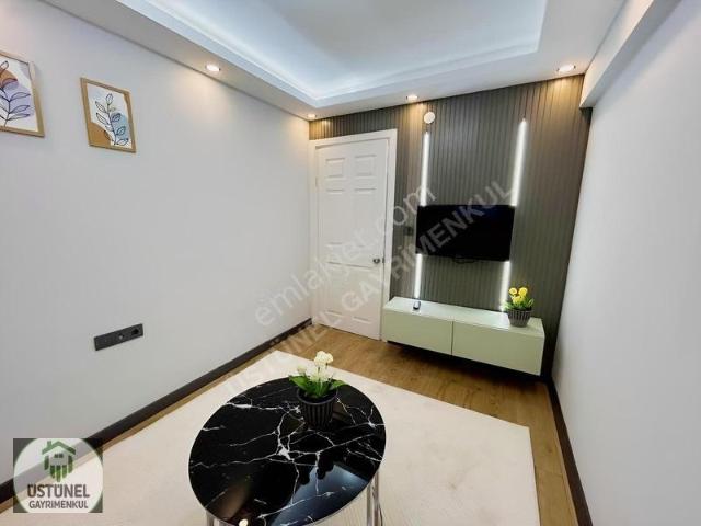 Üstünel'den Ayrı Mutfaklı Lüx Tasarımlı 1+1 Eşyalı Satılık Daire
