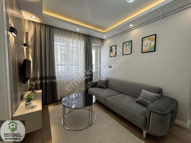 Üstünel'den Cadde Üzeri 2+1 Ara Kat Sıfır Eşyalı Satılık Daire