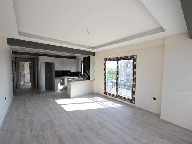 Üstünkent'ten Eski Mezitli'de Sıfır Yapıda Kiralık 1+1 Daire