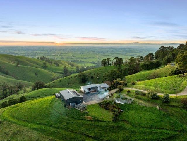 Up in the clouds! Well appointed off grid home with impressive shedding